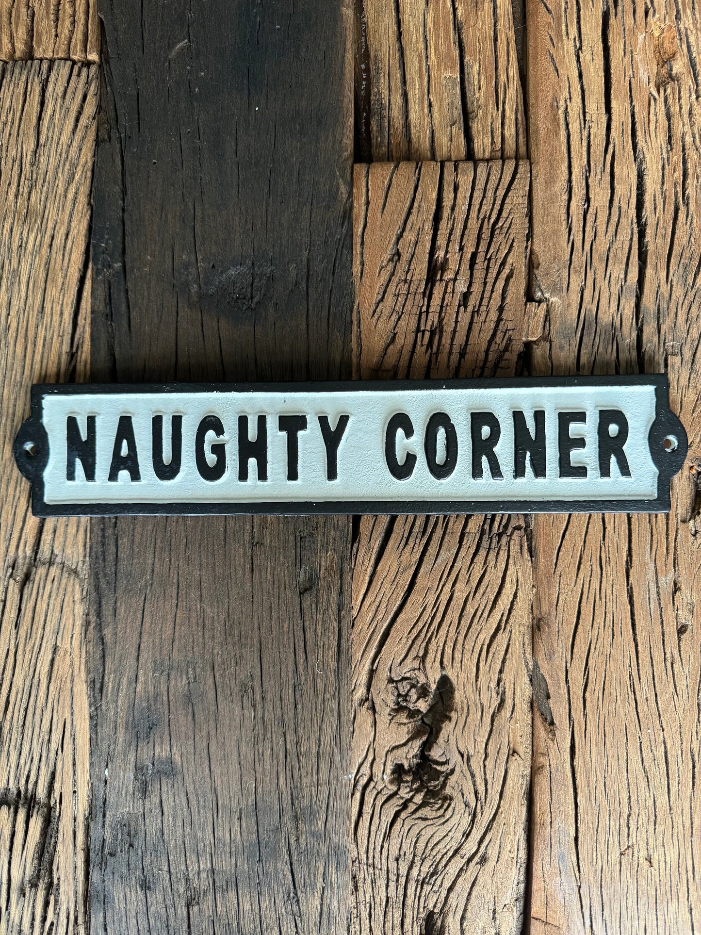 NAUGHTY CORNER Metal Cast Iron Wall Sign